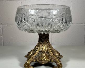 LOEVSKY & LOEVSKY CUT CRYSTAL COMPOTE
| Large cut crystal bowl with cast brass base, marked on bottom “L & L / 8272” - h. 10 x dia. 9 in
