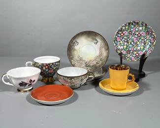 (13pc) Assorted Tea Cups | Including one yellow with gold interior Demi-tasse cup with matching saucer from Norway, additional saucer, display cup and saucer made in England, hand-painted dragon cup from China with extra saucer, Limoges cup with two handles and top and compatible saucer and royal imperial teacup. - h. 2 x dia. 4 in (Dragon cup)