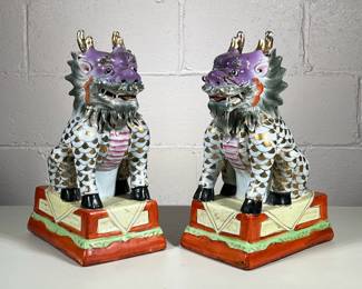 (2pc) PAIR OF COLORFUL CERAMIC FOO DOGS | Pair of colorfully glazed ceramic foo dogs with gilt design - h. 14 x w. 6 x d. 8.75 in