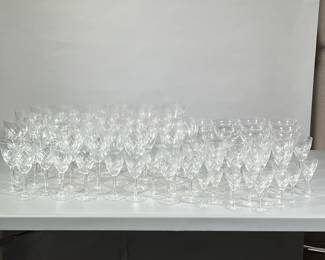 (87pc) HUGE LOT CRYSTAL/GLASSWARE | Including: 34 red wine glasses, 12 champagne glasses, 8 white wine glasses, 21 water goblets, and 12 cordial glasses
Dimensions: h. 8 x dia. 3.75 in (red wine glasses)