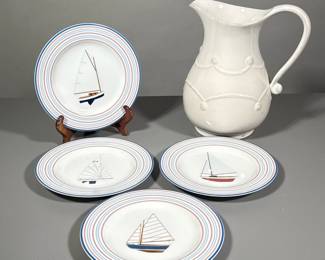 (5pc) Pitcher And Plates | Large white ceramic pitcher and 4 small red, white and blue plates with different sailboat on each. - h. 10.5 x w. 9 in (pitcher)