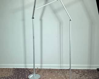 (2pc) PAIR KONCEPT FLOOR LAMPS | Pair of articulating aluminum KONCEPT floor lamps
Dimensions: h. 74 x w. 31 in (fully extended in each direction)