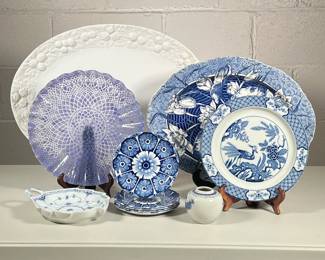 (11pc) Blue And White Serving Pieces | Large white turkey platter, Wedgewood floral platter, round lilac fluted dish, Royal Copenhagen leaf-shaped dish, Wood and Sons English dish, 5 small blue and white floral plates, small blue and white vase. - w. 16 x l. 21 in (White platter)