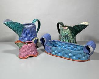 (4pc) Collection Of Art Pottery Signed | Including 3 pitchers and a planter Signed Flyn - h. 10 x w. 4 x l. 13 x d. 4 in (large pitcher)