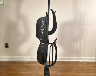 CELLO SCULPTURE | Cut & welded steel cello sculpture
- h. 58.5 x w. 13 x d. 13 in