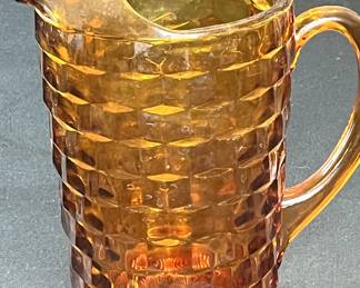 Mid-century modern amber glass pitcher.