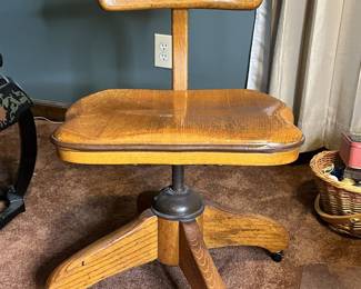 Antique oak banker's chair, early 20th Century