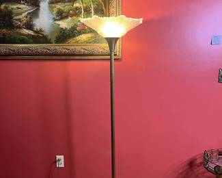 A vintage torchiere floor lamp.