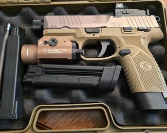 FN 502 semiautomatic 22LR with streamlight with a Vortex optical sight with four magazines