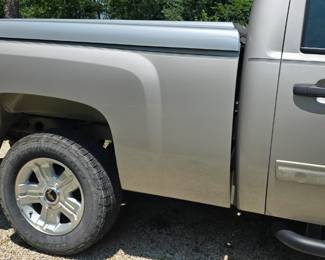 2009 Chevy Silverado, 107K miles, clean cloth interior.