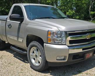 2009 Chevy Silverado, 107K miles, clean cloth interior.