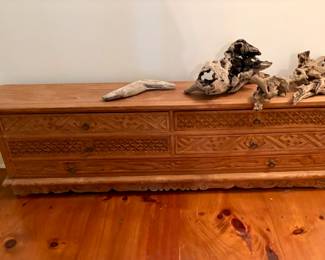 Long carved cabinet