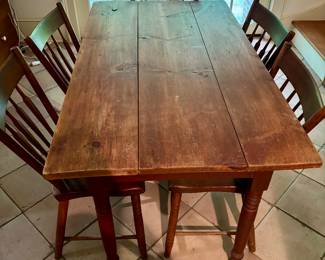 Primitive dining table and 6 straight back chairs
