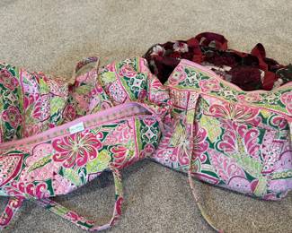 Large collection of Vera Bradley purses and bags