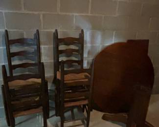 Antique Round table
4 Ladder Back Woven Seat Chairs