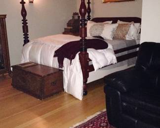 Early 1800’s turned post bed converted for use with a queen mattress. Comes with a Pratt and Legget mechanical base.