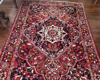 10’ by 7’ Iranian Rug.  275.00.   