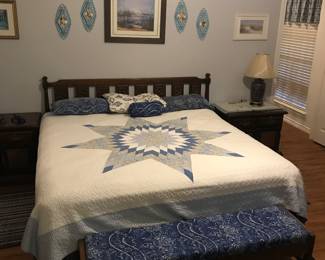 King bed set with nightstands, coastal art and decor