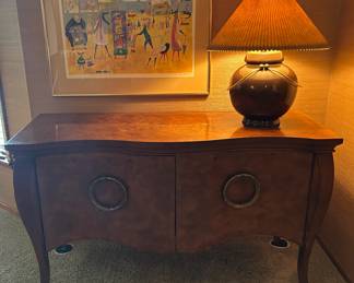 I love this piece and how cool is that lamp