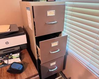4 drawer metal file cabinet - $50 (located upstairs)