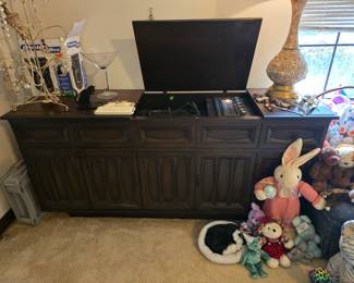 Mid century, TMA brand entertainment console with working record player and radio. Excellent condition. $1000