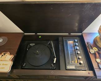 Mid century, TMA brand entertainment console with working record player and radio. Excellent condition. $1000