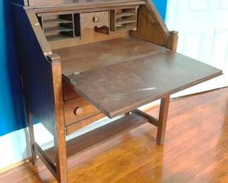 108 - Oak Mission Style Slant Front Desk 46 x 34 x 18 1 knob missing