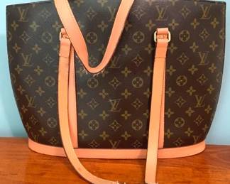12 - Louis Vuitton Marked Ladies Handbag wear on strap 12 x 16