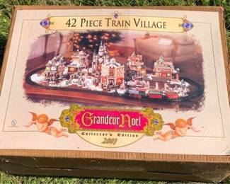 620 - 42pc Train Village in Box You are buying a used as-is electric/electronic item. We do not guarantee all components are present, and if it is not expressly stated, it is untested.