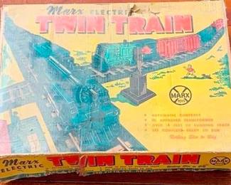 225 - Marx Electric Twin Train Set in Box O Scale You are buying a used as-is electric/electronic item. We do not guarantee all components are present, and if it is not expressly stated, it is untested.
