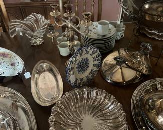 Loads of serving pieces of all sizes and shapes