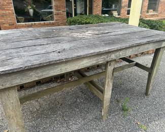 Fantastic table - lowered it would be a great dining table. Left this height it would be a great center table or a craft table - naturally weathered
