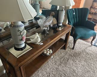 One of several sofa tables - note pair of porcelain lamps with floral applied design and a fan back chair circa 1940