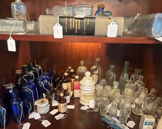 Huge amount of vintage medical items for display. Some of these bottles were made in Mobile in the 19th C.