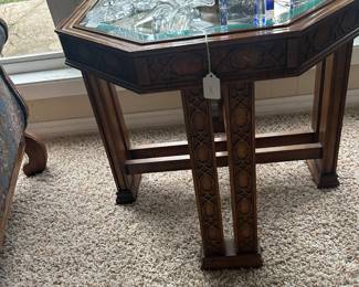 One of a pair of Asian-design side tables with octagonal inset tops