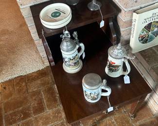 Step back table with vintage steins