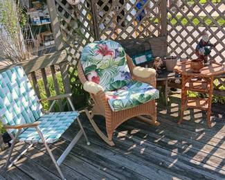 Wicker rocking chair $65.00
Rattan side table $35.00