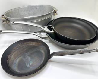 2 Large Roasting Pans By Household Institute, 2 Large Calphalon Non Stick Frying Pans & Smaller Iron Pan
Lot #: 74