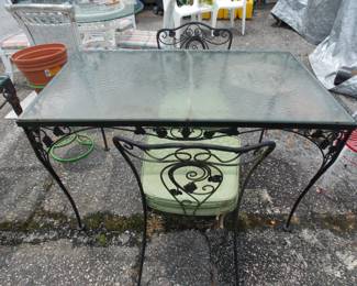 Wrought iron table and 2 chairs