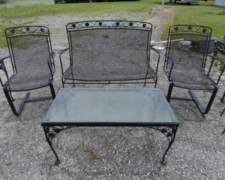 Wrought iron bench and 2 chairs with coffee table