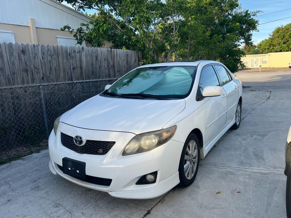 2009 White Toyota Corolla - 165,000 miles - Clean title
VIN# 2T1BU40E99C16064