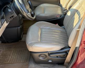 The front seats are adjustable and leather too! 