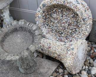 Small concrete bird baths