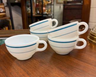 Mid Century arched mirrors, antique tables and Corelle, Pyrex and Corning Ware are in our shop.