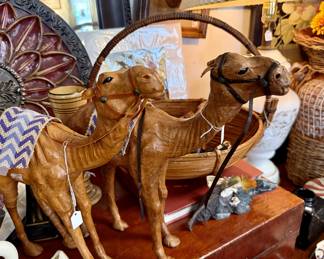 Wooden camels and old trunks.