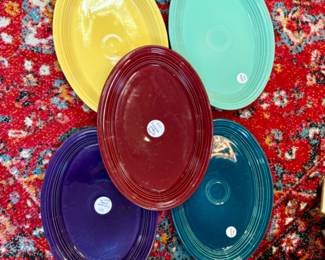 Fiesta Ware Platters in several colors.