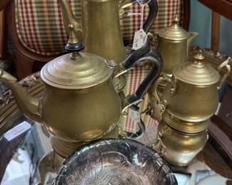 Antique brass and silver pieces.