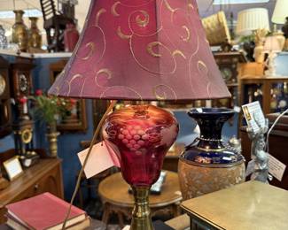 Gorgeous lamps and vases and old books.