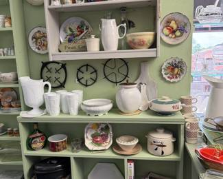 Platters, trivets, pitchers, milk glass.
