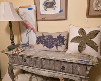 Shabby wash console, beautiful pillows , room packed with signs.